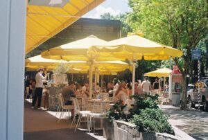 restaurant patio with yellow umbrellas